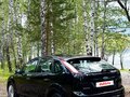 2010 Ford Focus II Рестайлинг, чёрный, 673000 рублей - вид 4