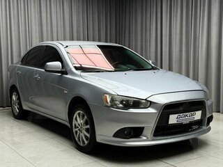 2011 Mitsubishi Lancer X Рестайлинг, серебристый, 659000 рублей, вид 3
