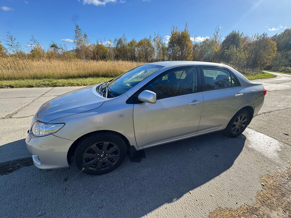 2008 Toyota Corolla AMT X (E140, E150), серебристый - вид 2