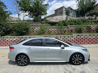 2022 Toyota Levin XII (E210) Рестайлинг, серебристый, 1790000 рублей, вид 2
