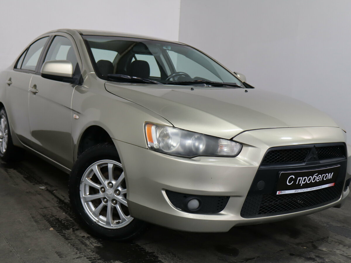 Открыть фотографии: Mitsubishi Lancer X