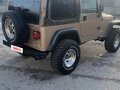 1998 Jeep Wrangler II (TJ), коричневый, 1070000 рублей - вид 2