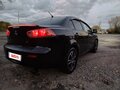 2008 Mitsubishi Lancer X, чёрный, 780000 рублей - вид 5