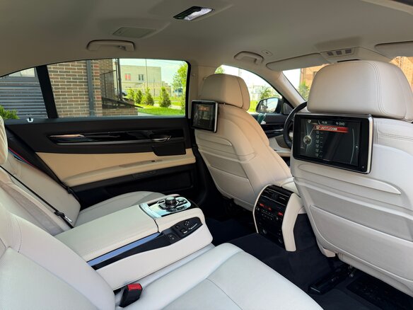 2012 BMW 7 серии Long 740Li xDrive V (F01/F02/F04) Рестайлинг, синий, 1900000 рублей - вид 12
