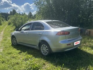 2009 Mitsubishi Lancer X, серебристый, 585000 рублей, вид 5