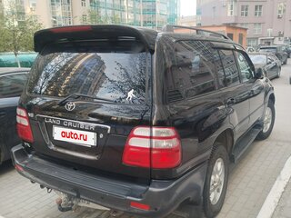 2004 Toyota Land Cruiser 100 Series Рестайлинг 1, чёрный, 2000000 рублей, вид 2