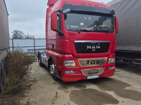 2011 MAN TGX, красный, 2500000 рублей - вид 7