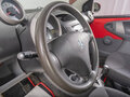 2007 Peugeot 107 I, красный - вид 11