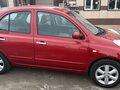 2010 Nissan Micra III (K12), пурпурный - вид 4