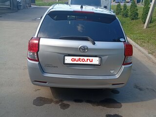 2015 Toyota Corolla Fielder XI (E160, E170, E180), серебристый, 990000 рублей, вид 4