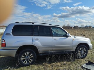 2003 Toyota Land Cruiser Cygnus 100 Series Рестайлинг 1, серый, 2000020 рублей, вид 1