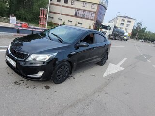 2013 Kia Rio 4-speed III, чёрный, 530000 рублей, вид 1
