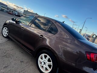 2014 Volkswagen Jetta VI Рестайлинг, коричневый, 720000 рублей, вид 4