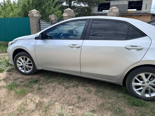 2014 Toyota Corolla XI (E160, E170, E180), серебристый, 1400000 рублей, вид 3