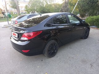 2012 Hyundai Solaris I, чёрный, 599000 рублей, вид 5