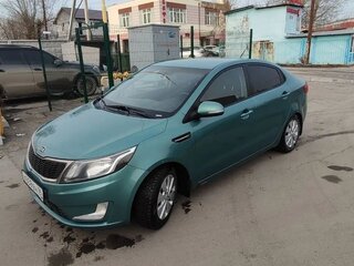 2012 Kia Rio 5-speed III, зелёный, 693150 рублей, вид 2