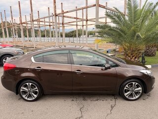 2016 Kia Cerato III, коричневый, 1620000 рублей, вид 5