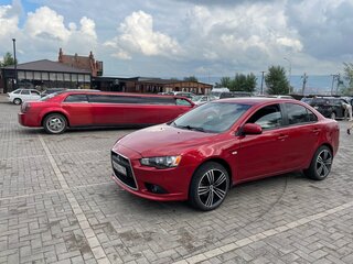 2011 Mitsubishi Lancer X Рестайлинг, красный, 850000 рублей, вид 2
