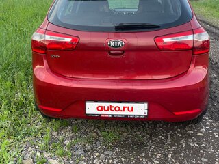 2013 Kia Rio 5-speed III, красный, 690000 рублей, вид 5