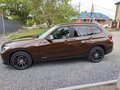 2013 BMW X1 20i I (E84) Рестайлинг, коричневый, 1360000 рублей - вид 4