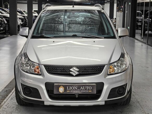 2013 Suzuki SX4 I (Classic) Рестайлинг, серебристый - вид 1