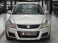 2013 Suzuki SX4 I (Classic) Рестайлинг, серебристый - вид 1