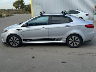 2013 Kia Rio 4-speed III, серебристый, 949999 рублей, вид 3