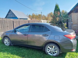 2015 Toyota Corolla XI (E160, E170, E180), серый, 930000 рублей, вид 3