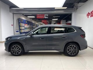 2025 BMW iX1 eDrive 25L, синий, 3589444 рублей, вид 4