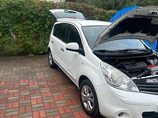 2011 Nissan Note I Рестайлинг, белый, 670000 рублей, вид 1