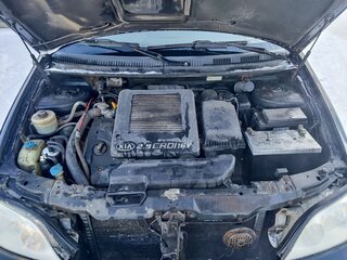 2005 Kia Carnival I Рестайлинг, чёрный, 550000 рублей, вид 3