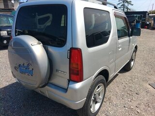 2013 Suzuki Jimny Kei car III Рестайлинг 2, серебристый, 640520 рублей, вид 5
