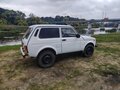 2012 Lada (ВАЗ) 2121 (4x4) I Рестайлинг, белый, 350000 рублей - вид 2