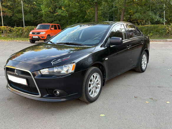 2013 Mitsubishi Lancer X Рестайлинг, чёрный, 840000 рублей
