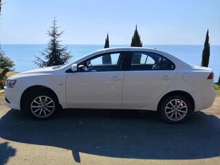 2012 Mitsubishi Lancer X Рестайлинг, белый, 680000 рублей, вид 3