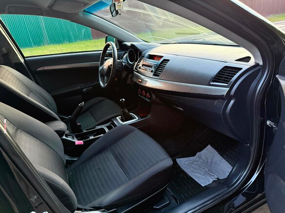 2012 Mitsubishi Lancer X Рестайлинг, чёрный, 669000 рублей - вид 9