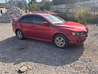 2008 Mitsubishi Lancer X, красный, 600000 рублей, вид 2