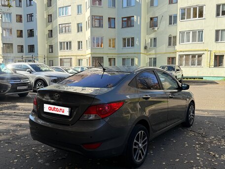 2011 Hyundai Solaris I, чёрный, 525000 рублей, вид 4
