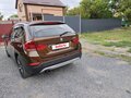 2013 BMW X1 20i I (E84) Рестайлинг, коричневый, 1360000 рублей - вид 6