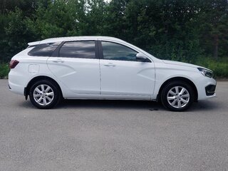 2024 Lada (ВАЗ) Vesta SW I Рестайлинг (NG), белый, 1360000 рублей, вид 4