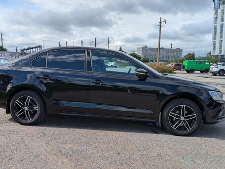 2014 Volkswagen Jetta VI Рестайлинг, чёрный, 890000 рублей, вид 4