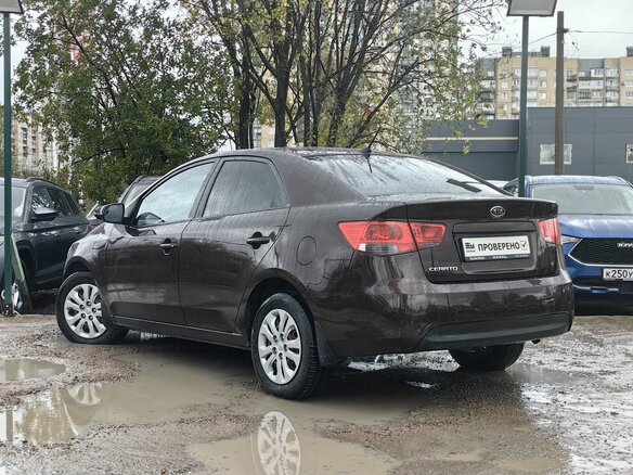 2010 Kia Cerato 6-speed II, фиолетовый, 469000 рублей - вид 8