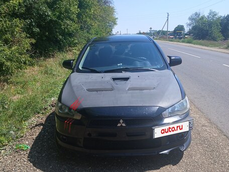 2010 Mitsubishi Lancer X, чёрный, 860000 рублей, вид 2