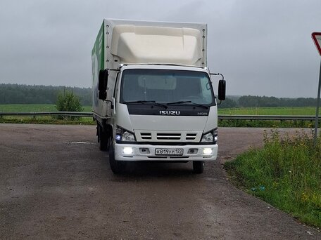 2009 Isuzu Elf (N-series), белый, 1450000 рублей, вид 1