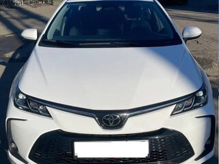 2023 Toyota Corolla XII (E210) Рестайлинг, белый, 1540000 рублей, вид 2