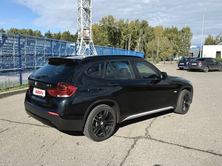2012 BMW X1 20d I (E84), чёрный, вид 2