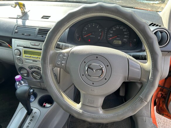 2002 Mazda Demio II (DY), оранжевый, 220000 рублей - вид 9