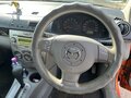 2002 Mazda Demio II (DY), оранжевый, 220000 рублей - вид 9
