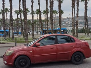 2010 Kia Rio II Рестайлинг, красный, 411399 рублей, вид 4