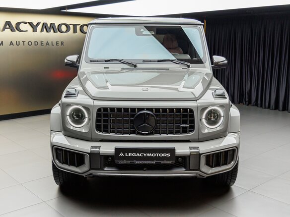 2026 Mercedes-Benz G-Класс AMG 63 AMG II (W465) Рестайлинг, серый - вид 1